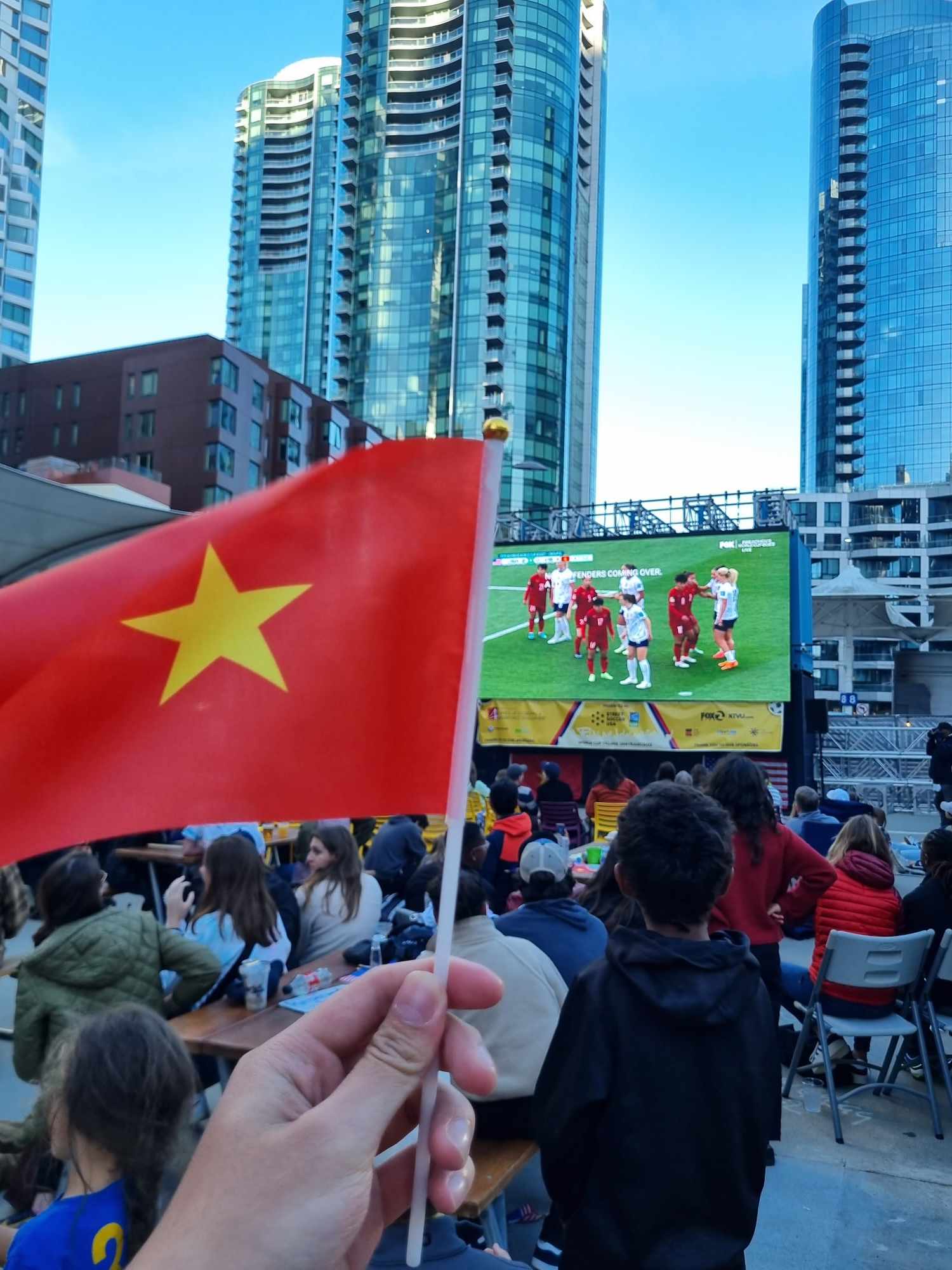 Kien cheering for the Vietnam Women's National Soccer Team in the World Cup match against the US Women's National Soccer Team