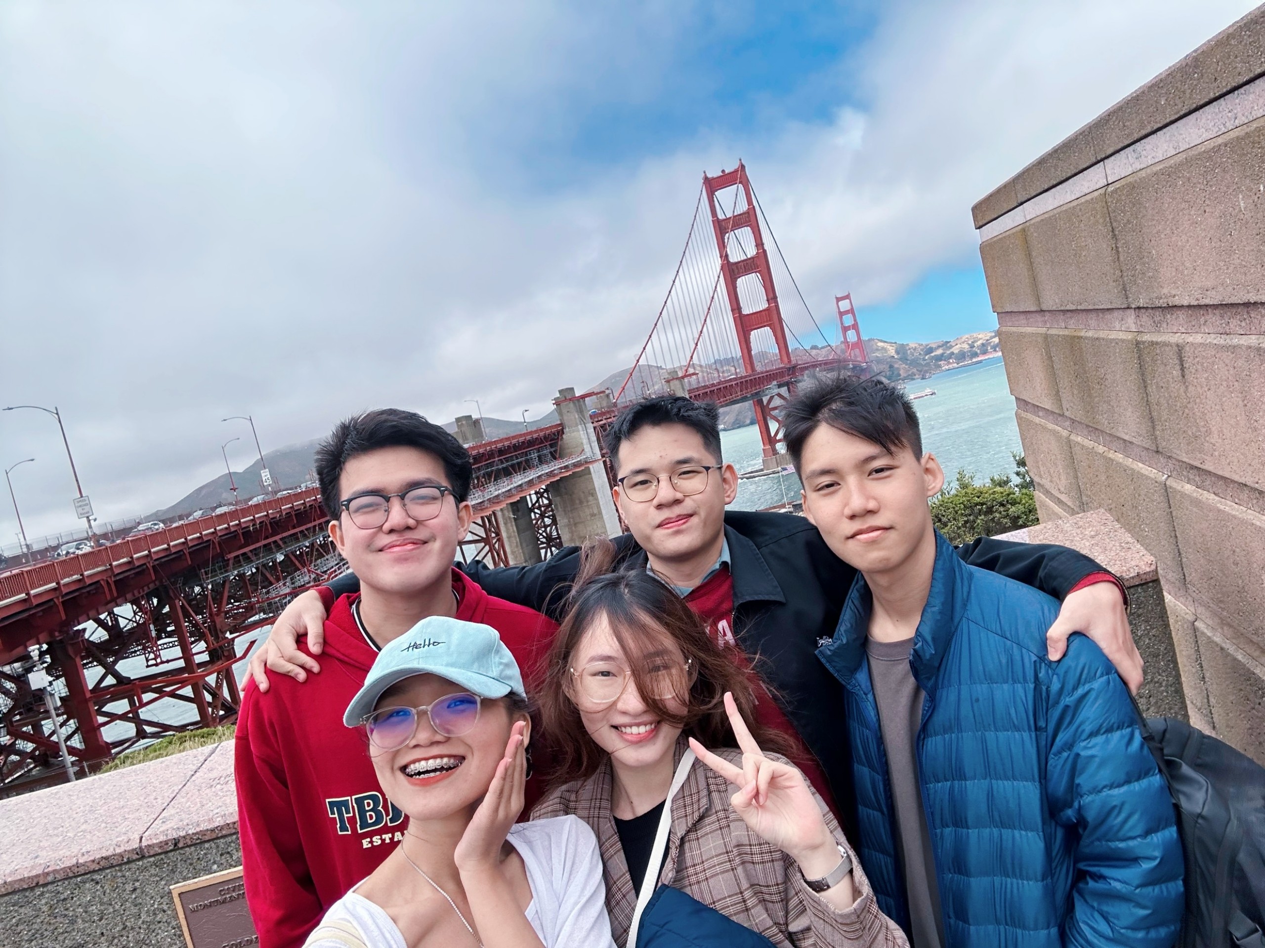 Kien and 5 other SVIC teammates on an outing trip during their program, posing in front of the Golden Gate Bridge